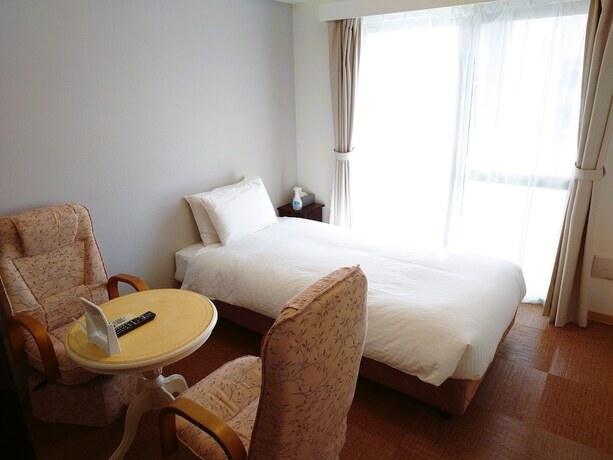 Imagen de la habitación del Hotel BiBi Cosmos Shintoshin. Foto 10