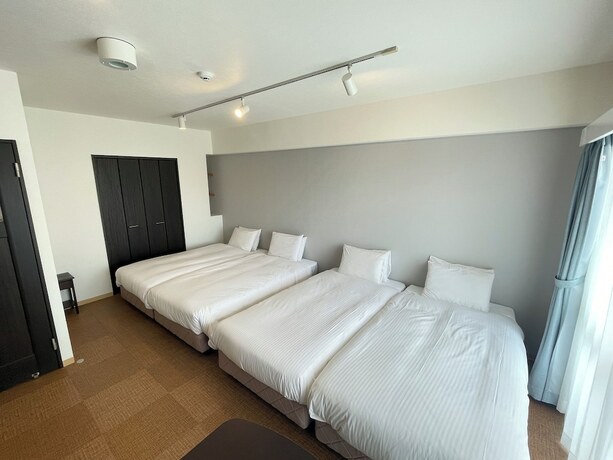 Imagen de la habitación del Hotel BiBi Cosmos Shintoshin. Foto 11