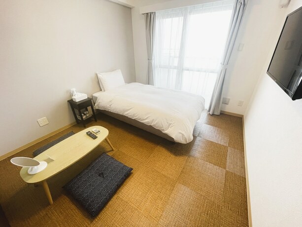 Imagen de la habitación del Hotel BiBi Cosmos Shintoshin. Foto 12