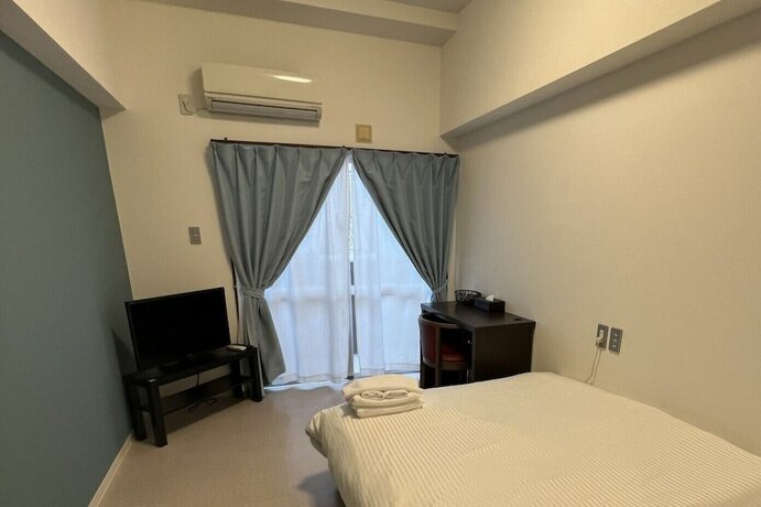 Imagen de la habitación del Hotel BiBi Tomariport. Foto 8