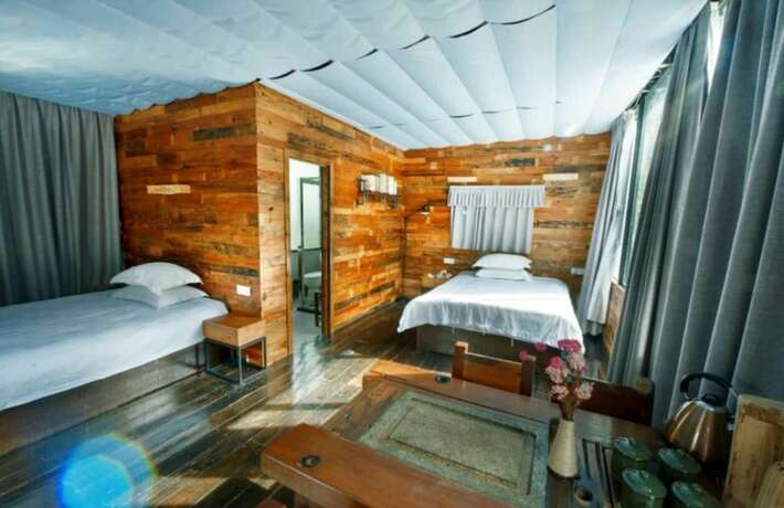 Imagen de la habitación del Hotel Bi'an Vacation Guesthouse. Foto 10