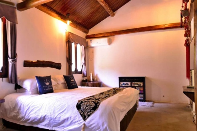 Imagen de la habitación del Hotel Bi'an Vacation Guesthouse. Foto 16