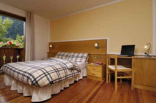 Imagen de la habitación del Hotel Biancaneve, Cogolo. Foto 3