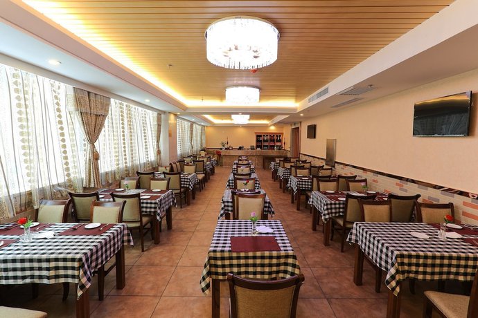 Imagen del bar/restaurante del Hotel Biancheng Internationl Hotel. Foto 5