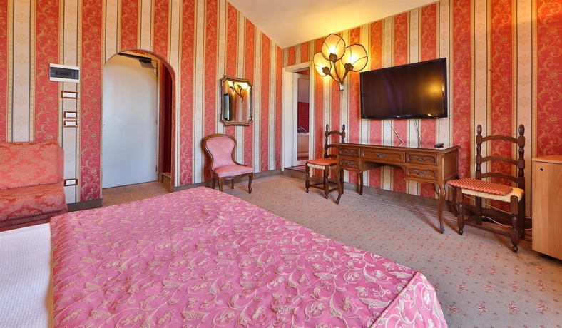 Imagen de la habitación del Hotel Biasutti. Foto 15