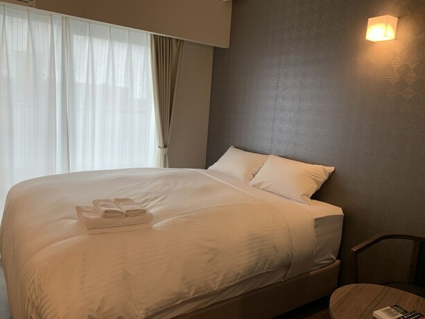 Imagen de la habitación del Hotel Bibi Kokusai Dori. Foto 25