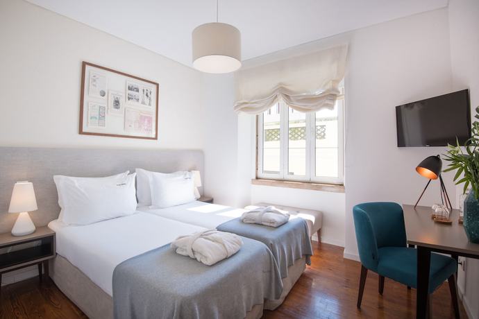 Imagen de la habitación del Hotel Bica Flh Suites. Foto 12