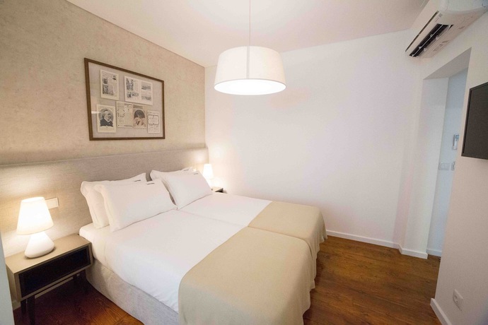 Imagen de la habitación del Hotel Bica Flh Suites. Foto 15