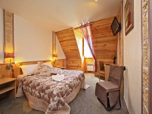 Imagen de la habitación del Hotel Bien-&Ecirc;tre Aux Cypr&egrave;s de Marquay. Foto 15
