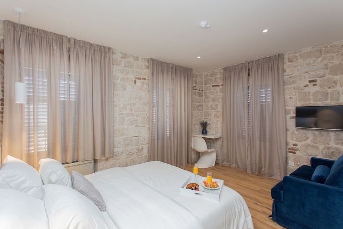 Imagen de la habitación del Hotel Bifora Heritage. Foto 9