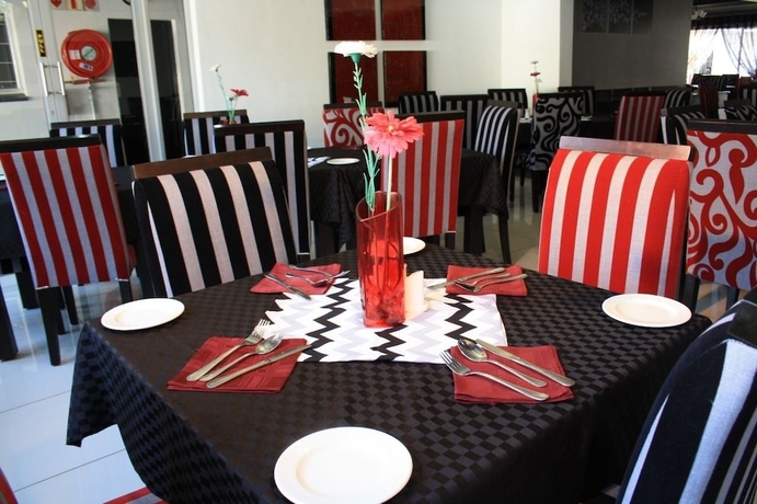 Imagen del bar/restaurante del Hotel Big Ben Lodge. Foto 3