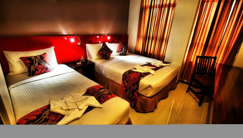 Imagen de la habitación del Hotel Big Daddy and Convention. Foto 23