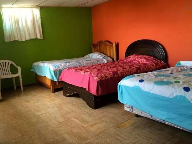 Imagen de la habitación del Hotel Big Mama House. Foto 5