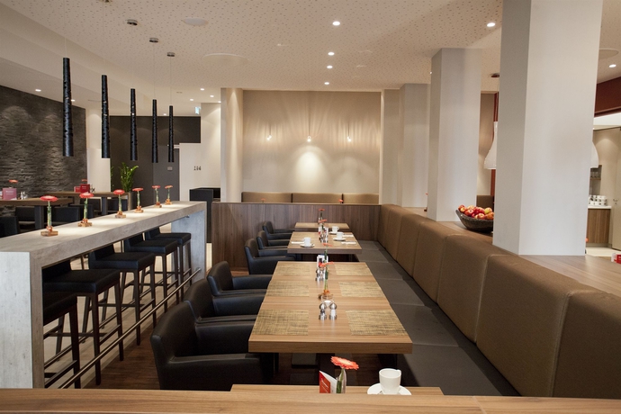 Imagen del bar/restaurante del Hotel BigBOX ALLGAEU Hotel. Foto 2