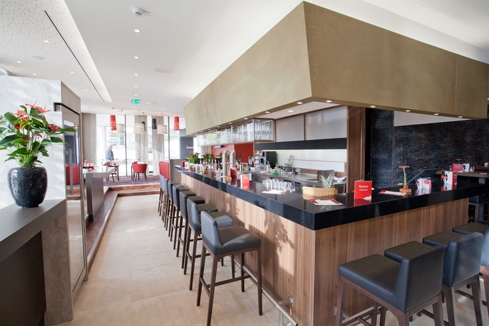 Imagen del bar/restaurante del Hotel BigBOX ALLGAEU Hotel. Foto 4