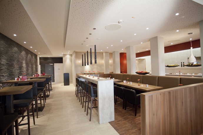 Imagen del bar/restaurante del Hotel BigBOX ALLGAEU Hotel. Foto 5