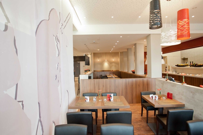 Imagen del bar/restaurante del Hotel BigBOX ALLGAEU Hotel. Foto 6