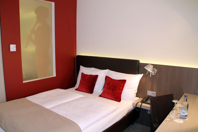 Imagen de la habitación del Hotel BigBOX ALLGAEU Hotel. Foto 13