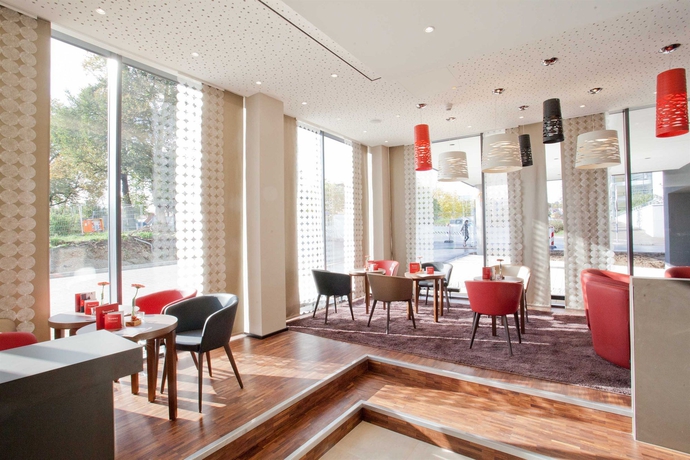 Imagen del bar/restaurante del Hotel BigBOX ALLGAEU Hotel. Foto 8