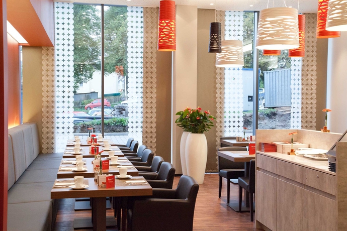 Imagen del bar/restaurante del Hotel BigBOX ALLGAEU Hotel. Foto 11