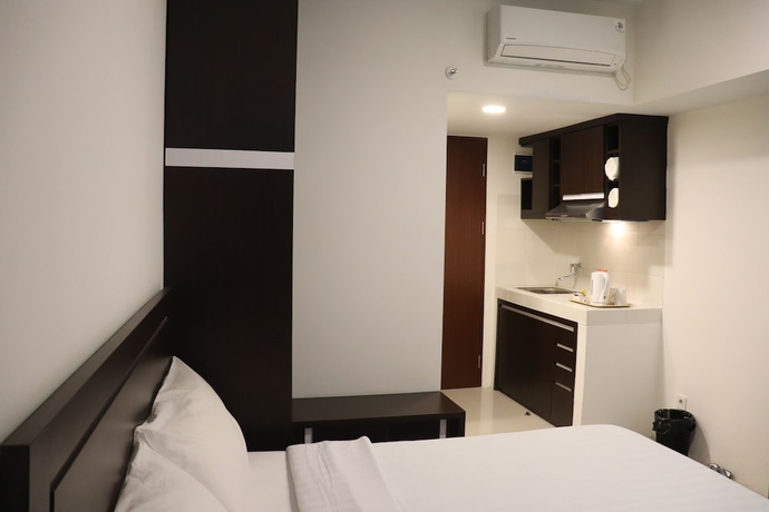 Imagen de la habitación del Hotel Bigland Renotel Bogor. Foto 16
