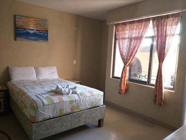 Imagen de la habitación del Hotel Bigu. Foto 11