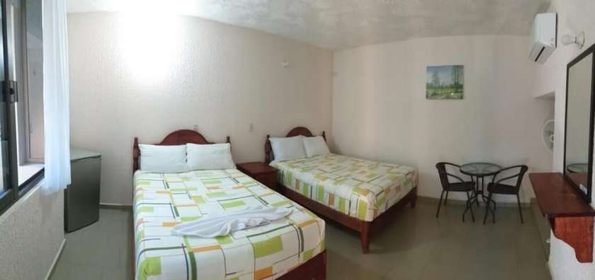 Imagen de la habitación del Hotel Bigu. Foto 13