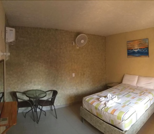 Imagen de la habitación del Hotel Bigu. Foto 14