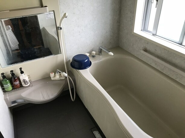 Imagen de la habitación del Hotel Biimata House. Foto 15