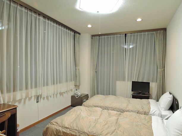 Imagen de la habitación del Hotel Bijintei. Foto 9