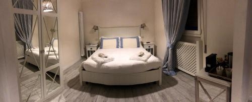 Imagen de la habitación del Hotel Bijou, Forte de Marmi. Foto 8