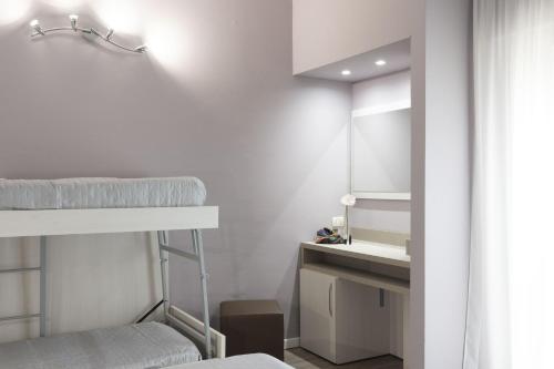 Imagen de la habitación del Hotel Bikini Tropicana Family. Foto 19