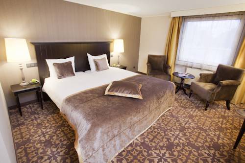 Imagen de la habitación del Hotel Bilderberg Château Holtmühle. Foto 10