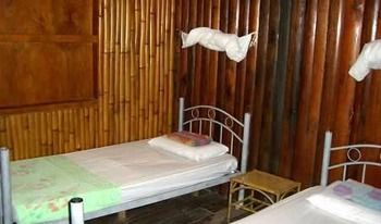 Imagen de la habitación del Hotel Bilit Adventure Lodge. Foto 13