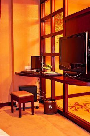 Imagen de la habitación del Hotel Billions Earn. Foto 8