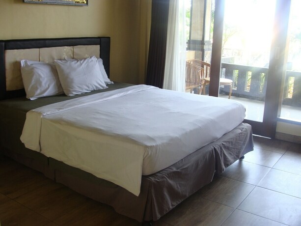 Imagen de la habitación del Hotel Bima Sakti House Canggu. Foto 7