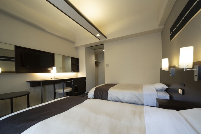 Imagen de la habitación del Hotel Binario Umeda. Foto 9