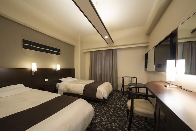 Imagen de la habitación del Hotel Binario Umeda. Foto 10