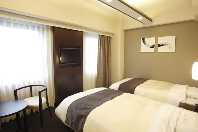 Imagen de la habitación del Hotel Binario Umeda. Foto 11