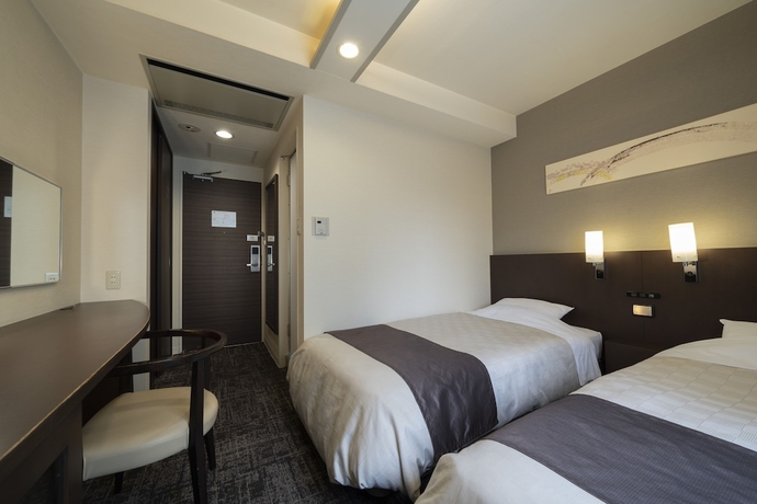 Imagen de la habitación del Hotel Binario Umeda. Foto 14