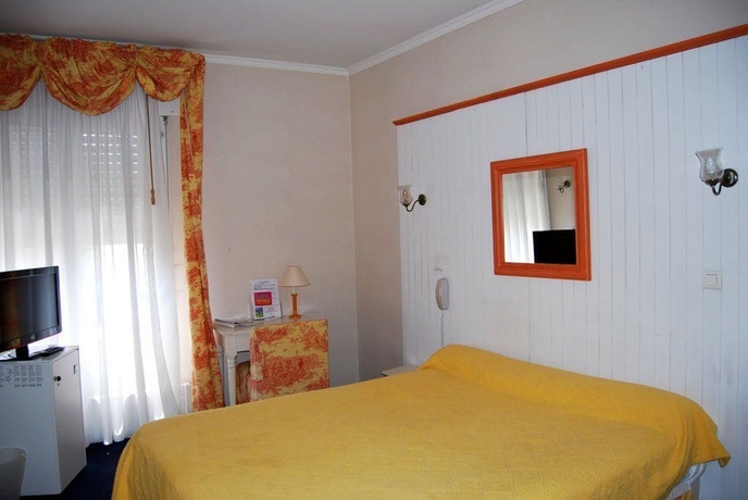 Imagen de la habitación del Hotel Biney. Foto 14