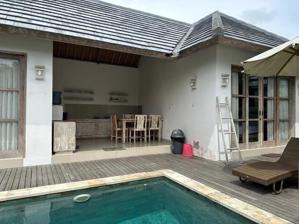 Imagen de la habitación del Hotel Bingin Garden Uluwatu. Foto 12