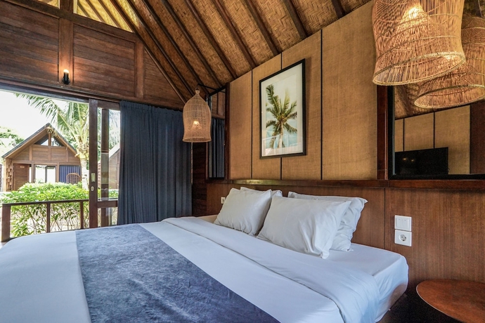 Imagen de la habitación del Hotel Bingin Lodge Uluwatu. Foto 8