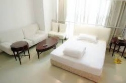 Imagen de la habitación del Hotel Bingyuan Apartment Shanghai. Foto 4