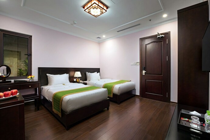 Imagen de la habitación del Hotel Binh Anh. Foto 17