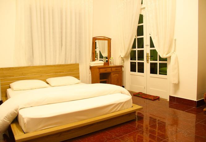 Imagen de la habitación del Hotel Binh Chau. Foto 15