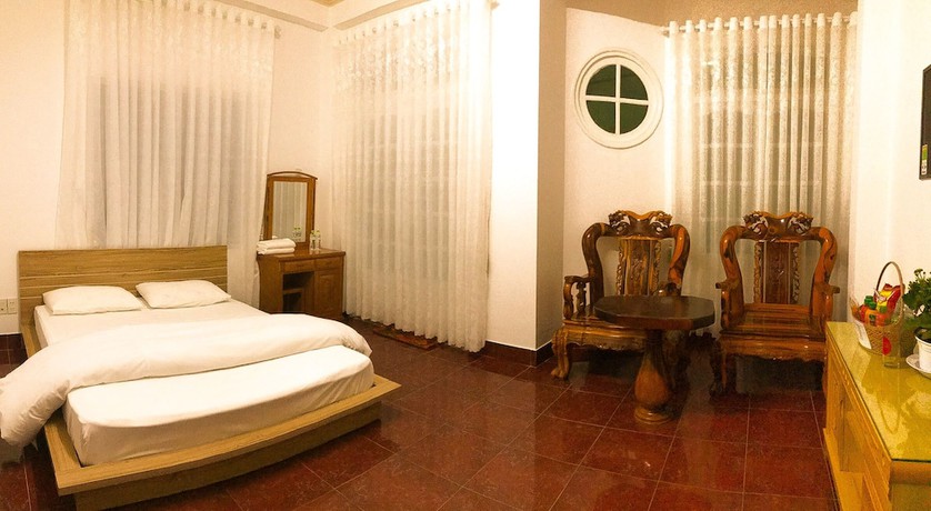 Imagen de la habitación del Hotel Binh Chau. Foto 16