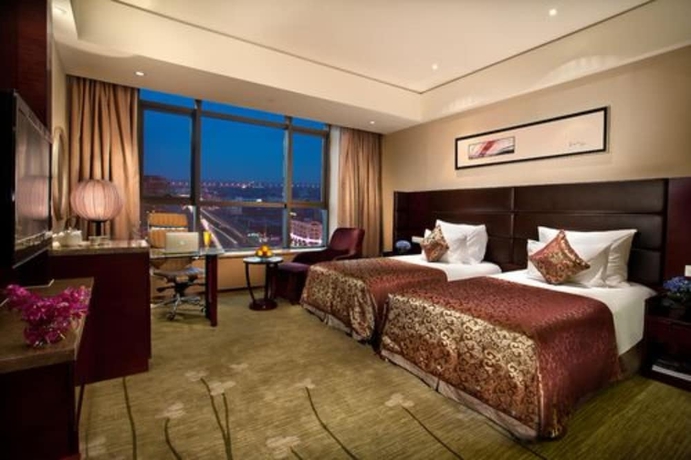 Imagen de la habitación del Hotel Binhai Grand. Foto 9