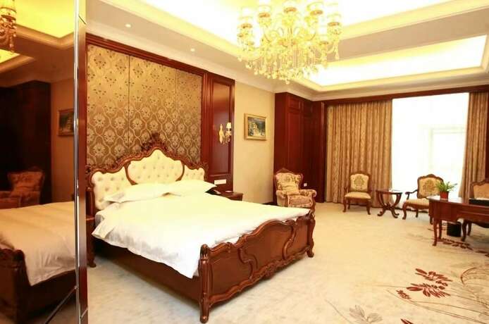 Imagen de la habitación del Hotel Binjiang Garden. Foto 9