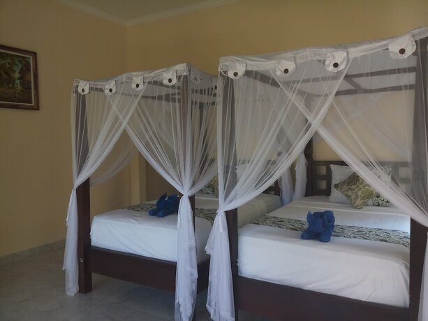Imagen de la habitación del Hotel Bintang Beach Villas, Bunutan. Foto 16